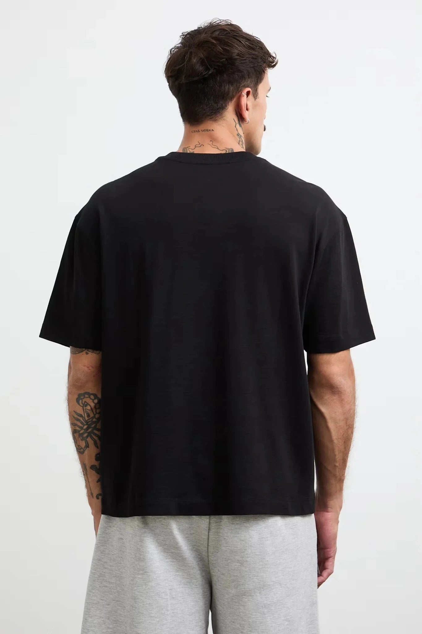 Черна мъжка тениска с малък принт на гърдите Medicine Roberto Fashion Store T-shirt RW26-TSM119-99X-S S
